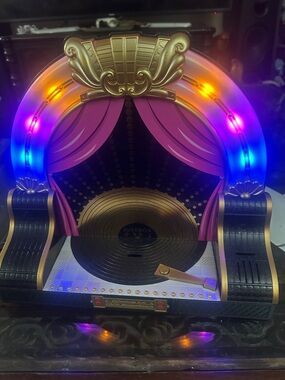 Retro Light-Up Jukebox Display with Pink Curtains
